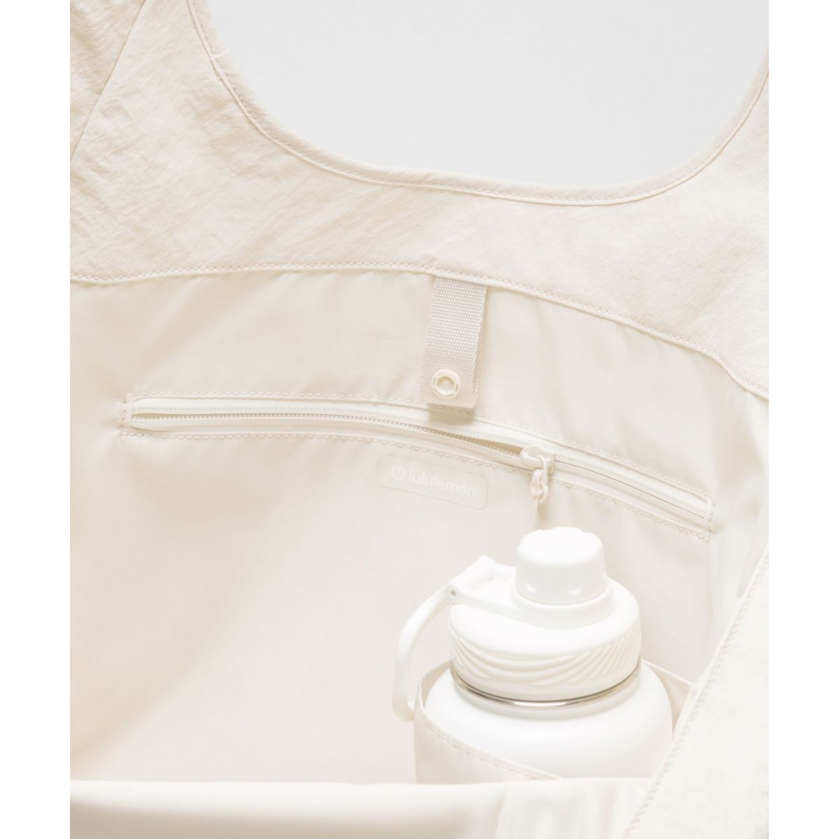 룰루레몬(LULULEMON) 슬라우치 숄더백 19L