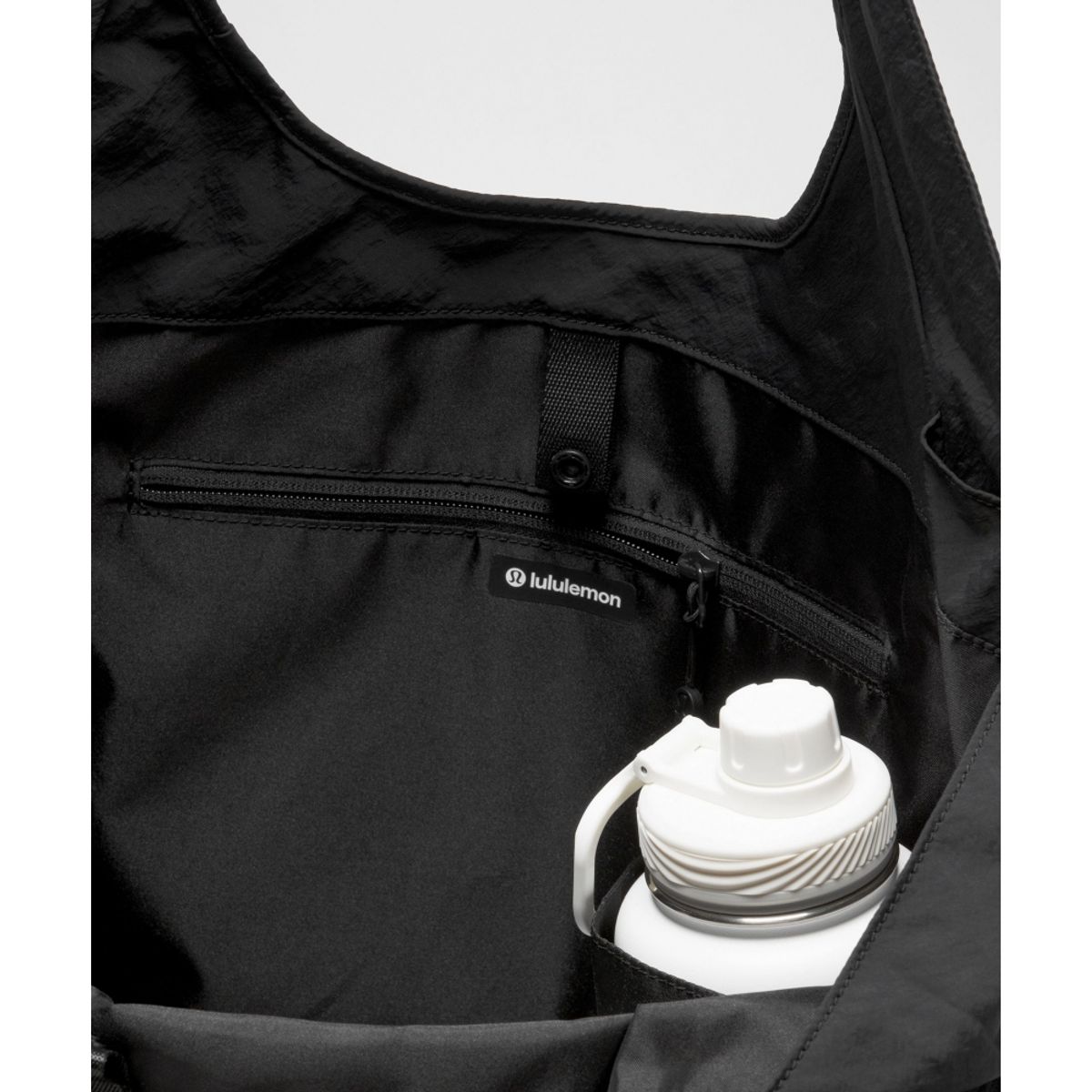 룰루레몬(LULULEMON) 슬라우치 숄더백 19L