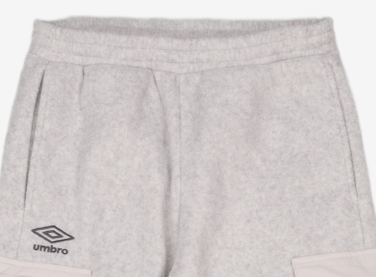 엄브로(UMBRO) WARM+ 우븐 믹스 플리스 카고 조거 팬츠 화이트 멜란지(UO421SFPO1) 70