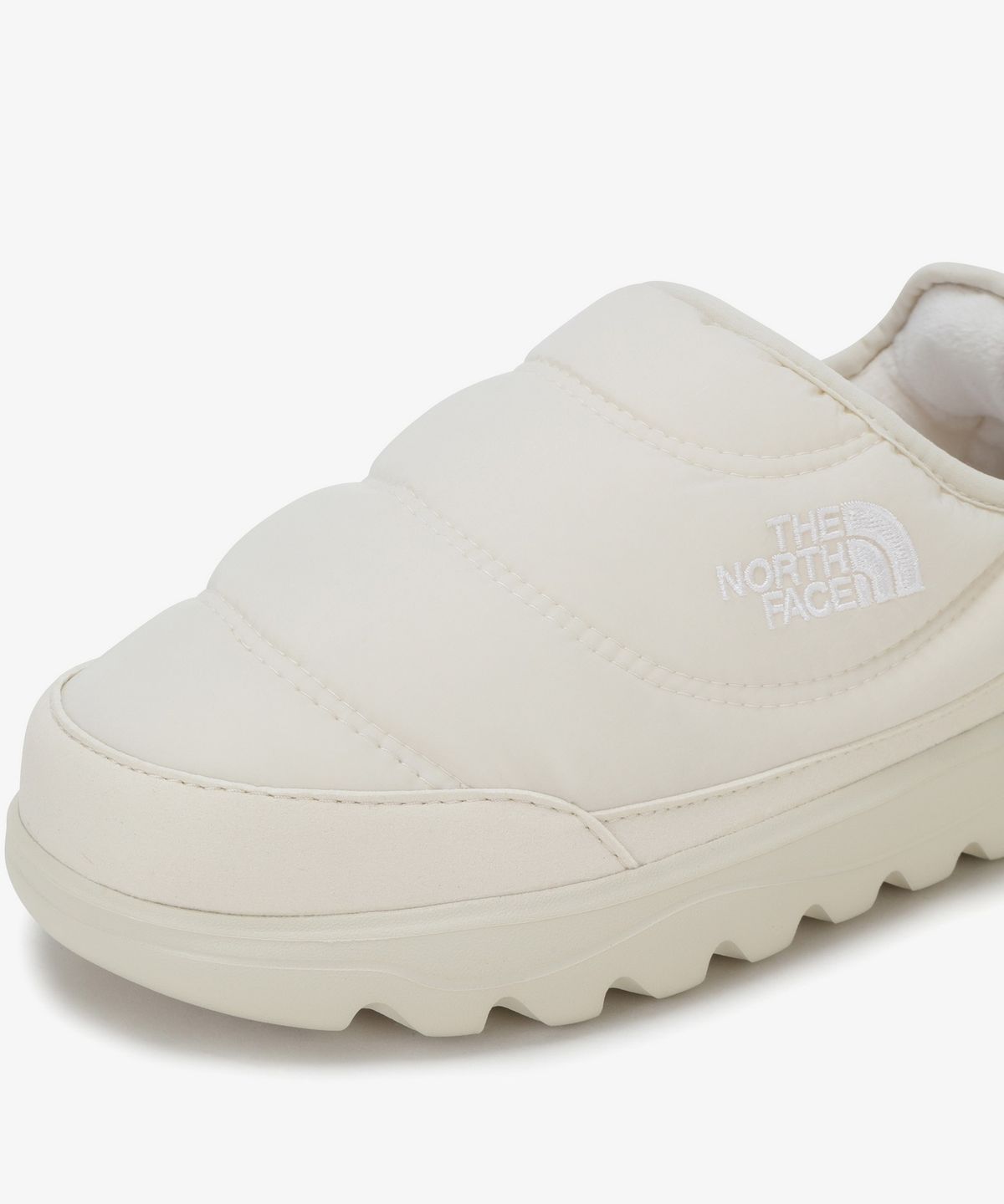 노스페이스(THE NORTH FACE) NS86S72M 돔 슬립 온 CREAM