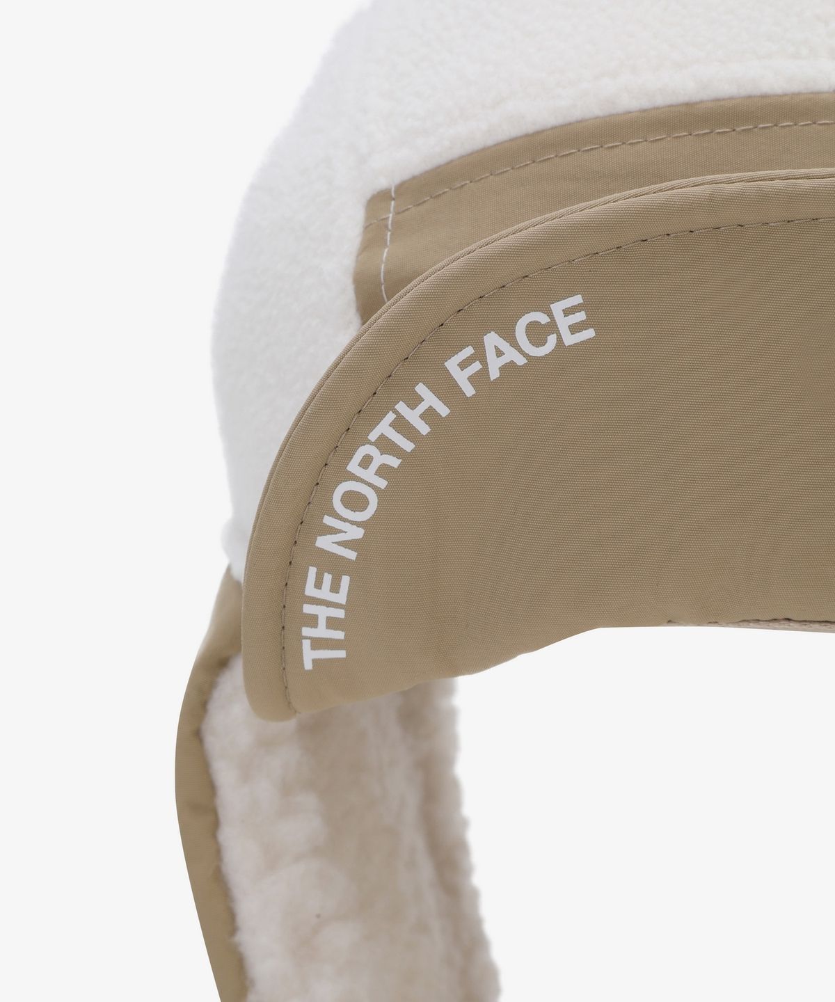 노스페이스(THE NORTH FACE) NE3CS57M 화이트라벨 플리스 이어머프 캡 CREAM