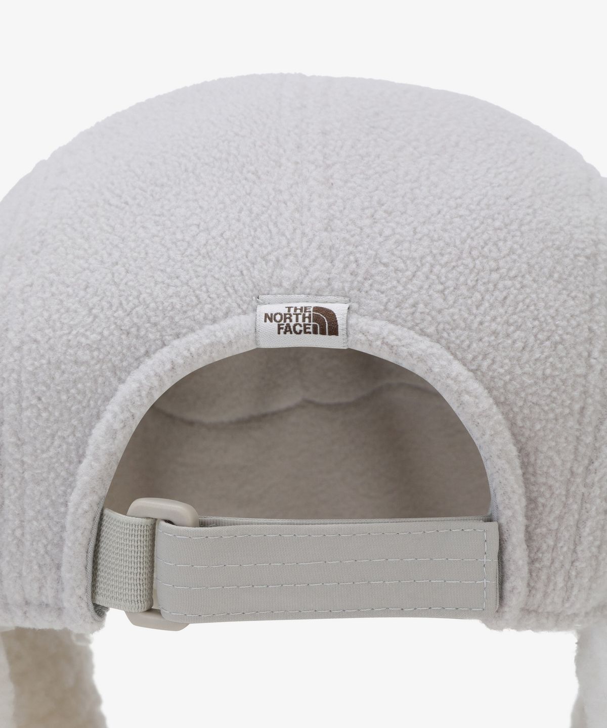 노스페이스(THE NORTH FACE) NE3CS57K 화이트라벨 플리스 이어머프 캡 WHITE SAND