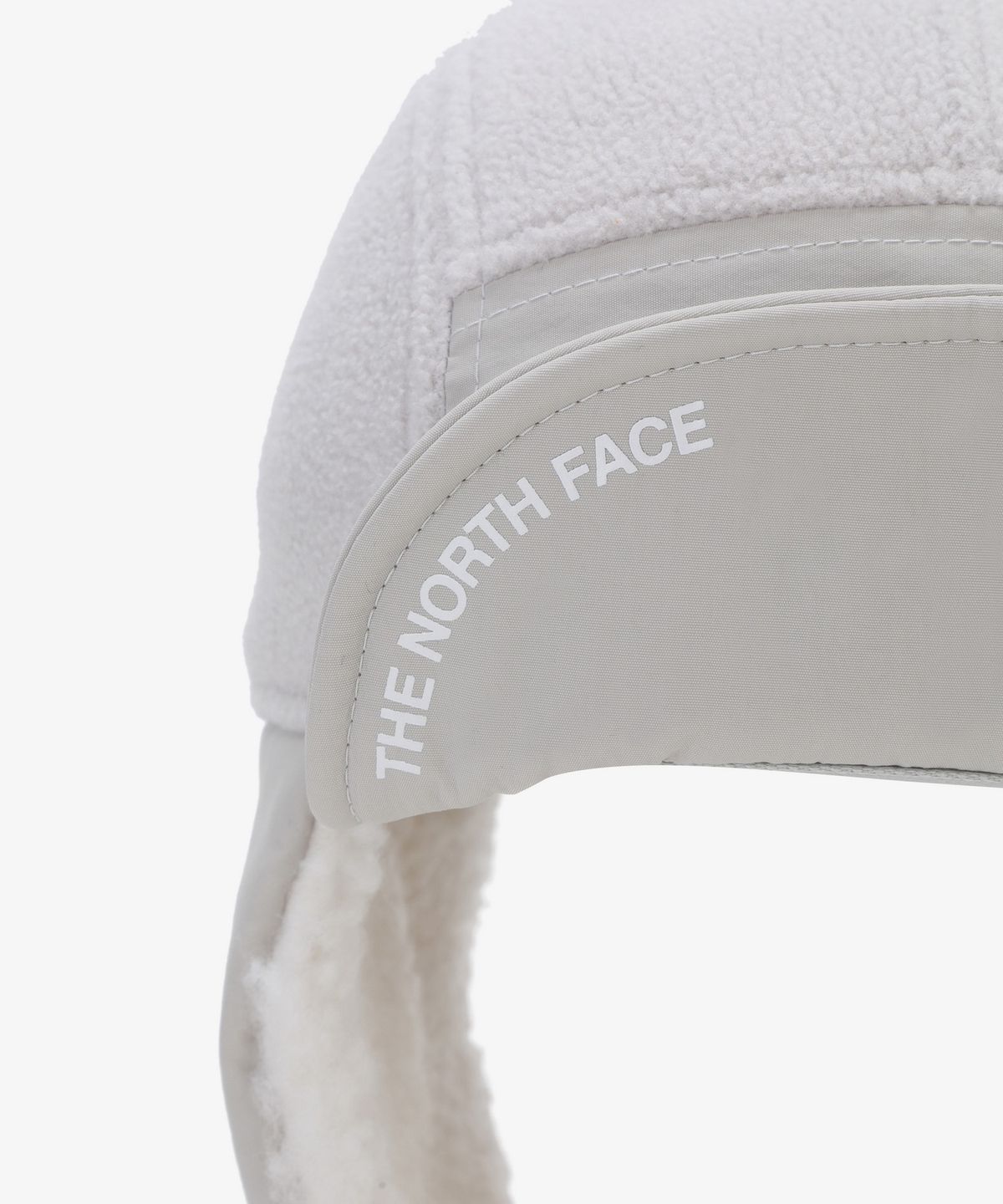 노스페이스(THE NORTH FACE) NE3CS57K 화이트라벨 플리스 이어머프 캡 WHITE SAND
