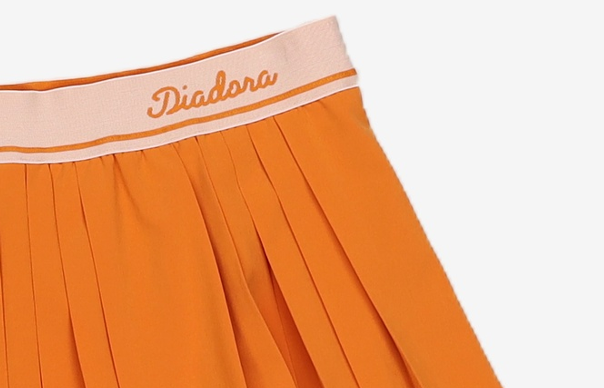 디아도라(diadora) 에르미나 테니스 플리츠 스커트 90