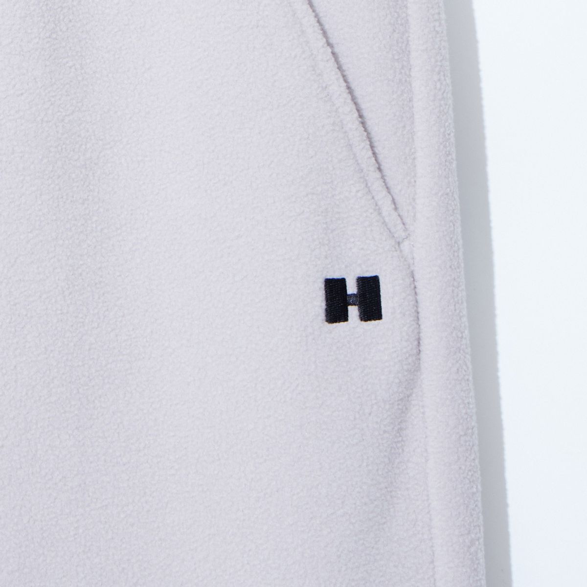 험머(HUMMER) 우먼 H 로고 플리스 조거 팬츠 라이트 그레이
