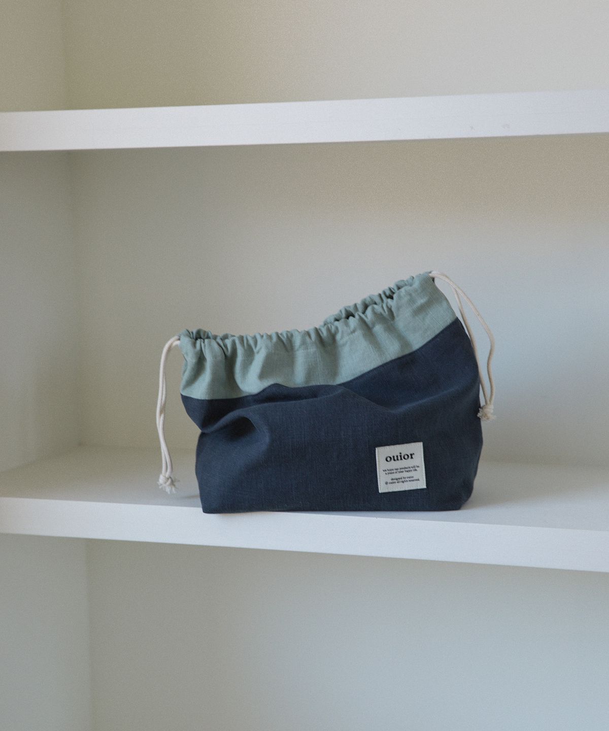위올(OUIOR) [기프트박스]ouior chubby string pouch_mint&navy