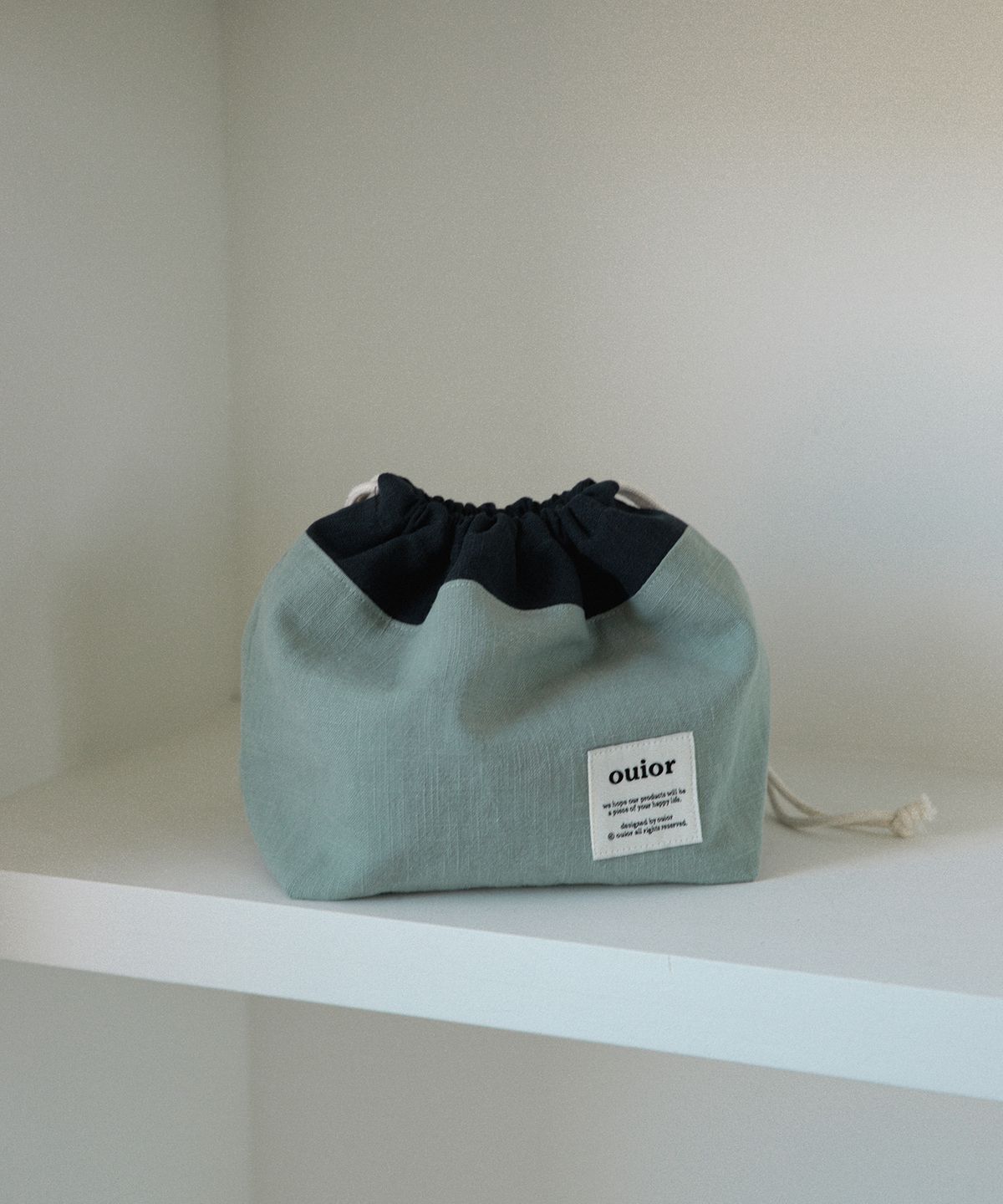 위올(OUIOR) [기프트박스]ouior chubby string pouch_navy&mint