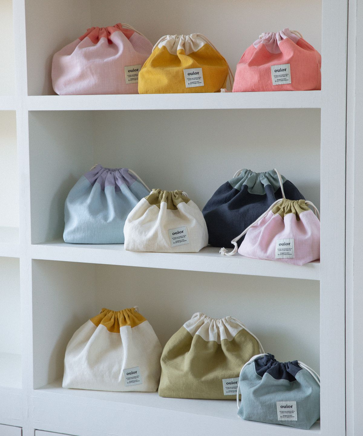 위올(OUIOR) [기프트박스]ouior chubby string pouch_olive&pink