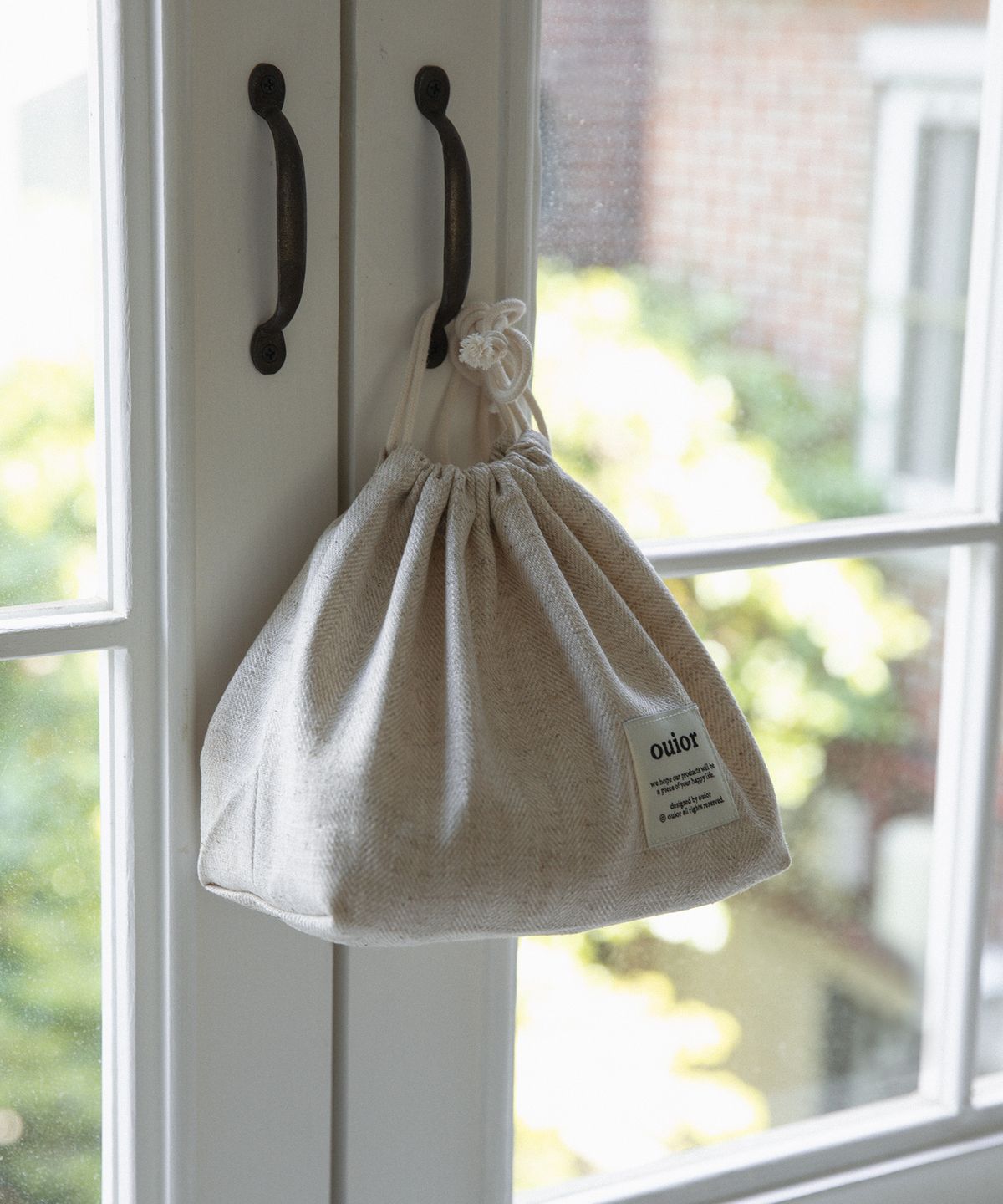 위올(OUIOR) [기프트박스]ouior chubby string pouch_herringbone beige