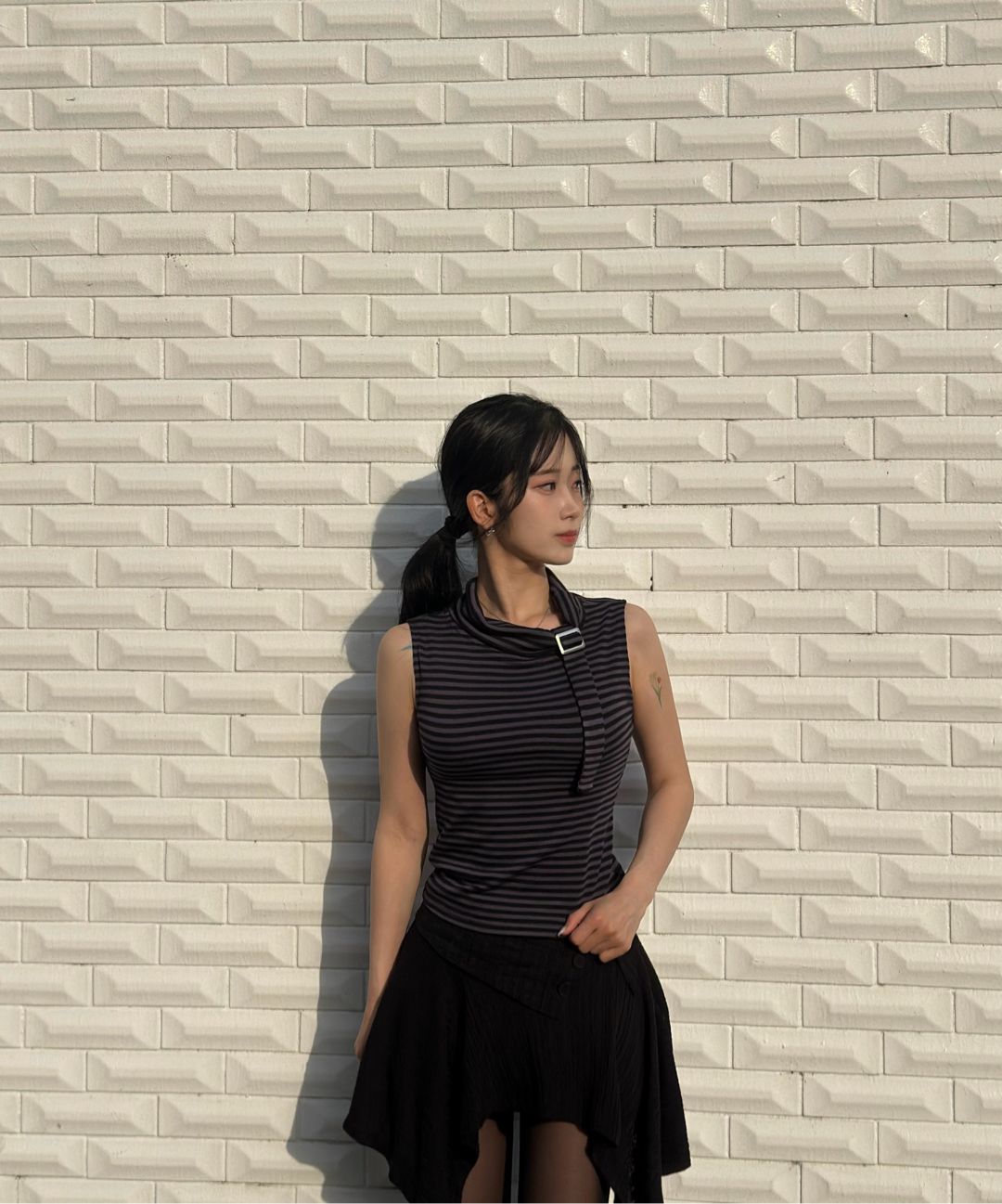 MUSINSA | MISEKI SEOUL Unbalanced flow mini skirt BLACK